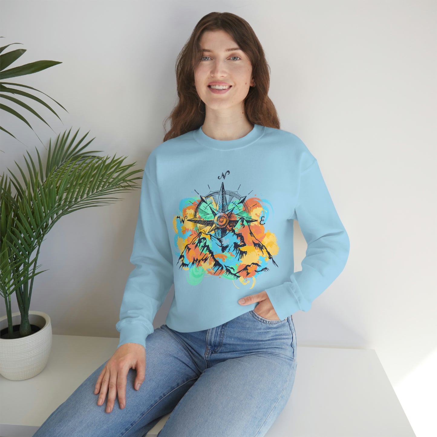 Light blue Camping Sweater. Pastel color mountains and compass light blue sweater