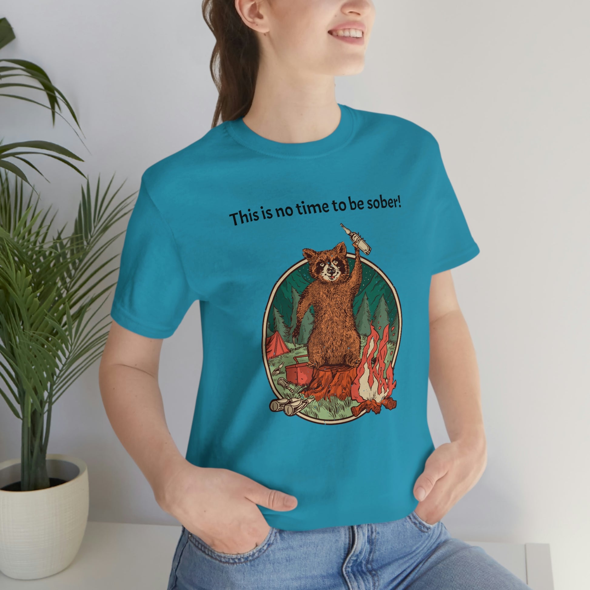 The Outdoor POD Store. This is no time to be sober raccoon campfire T-shirt. Aqua