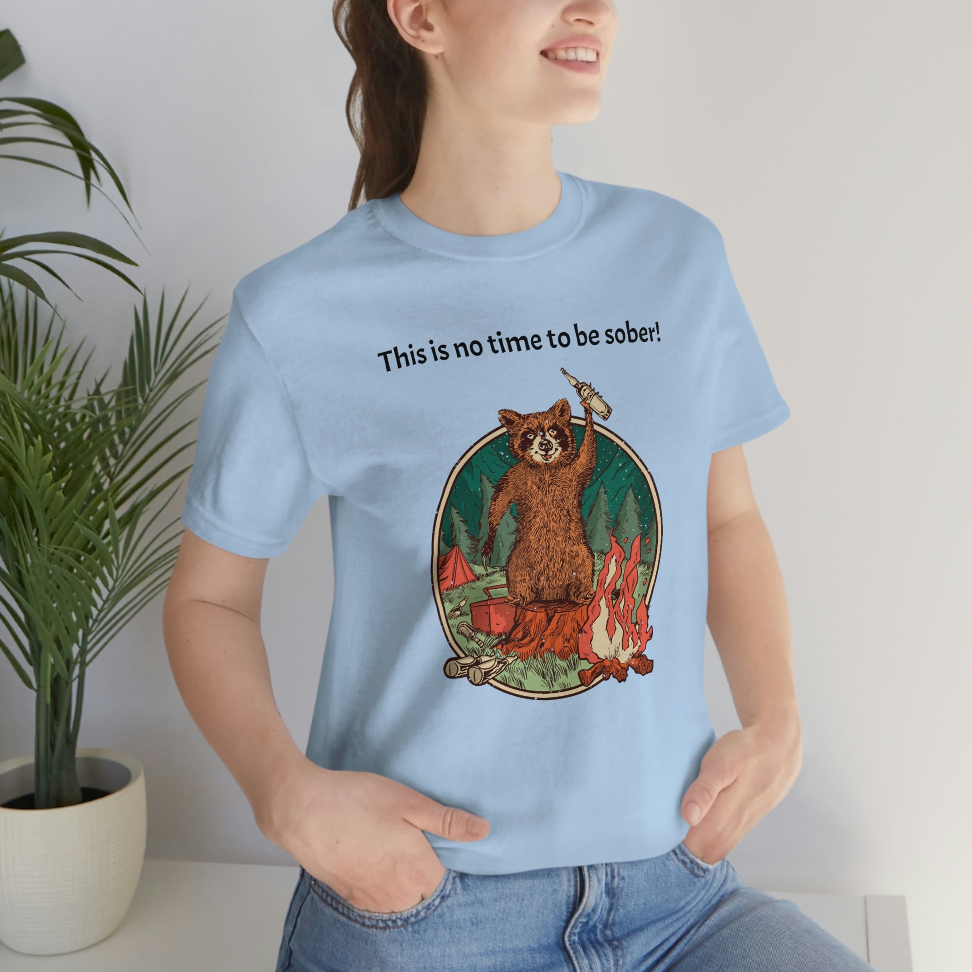 The Outdoor POD Store. This is no time to be sober raccoon campfire T-shirt. Baby Blue